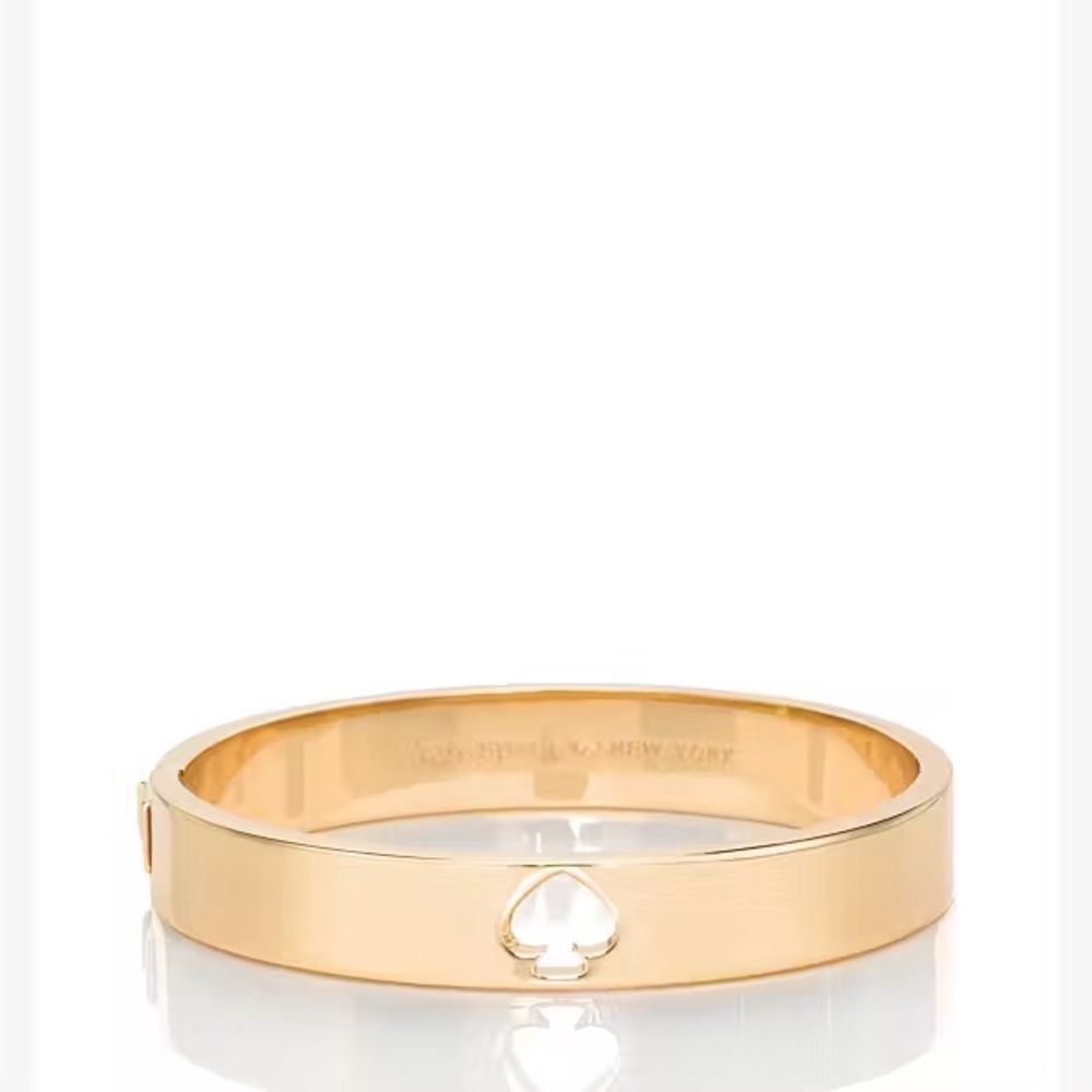 Kate spade gold hole punch spade hinge bangle